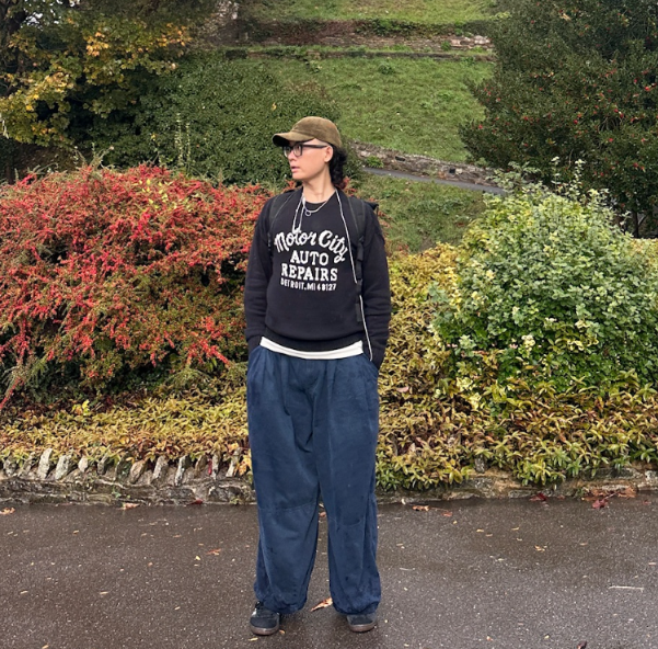 Brooklyn standing in a garden
